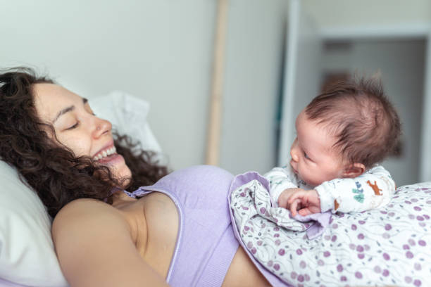 Postpartum Lochia Guide: Bleeding, Color Changes &amp; Warning Signs